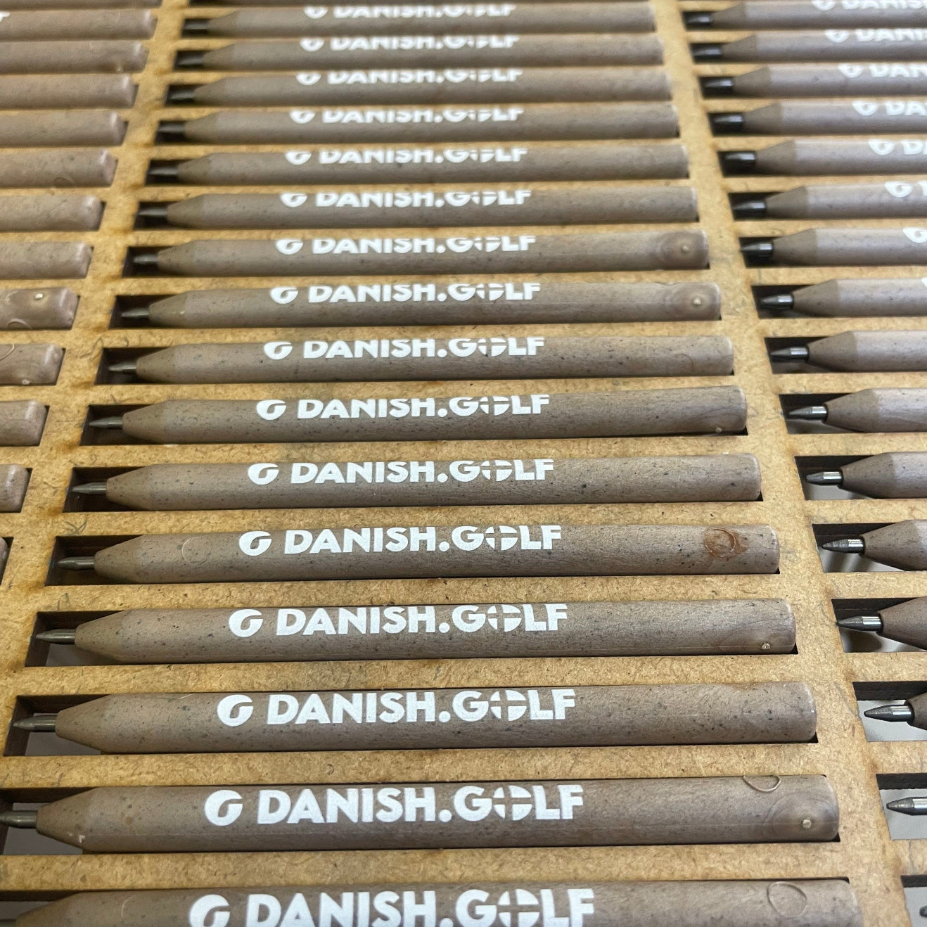 GreenUp Golf logo pencil made from upcycled coffee. Eco friendly. Sustainable